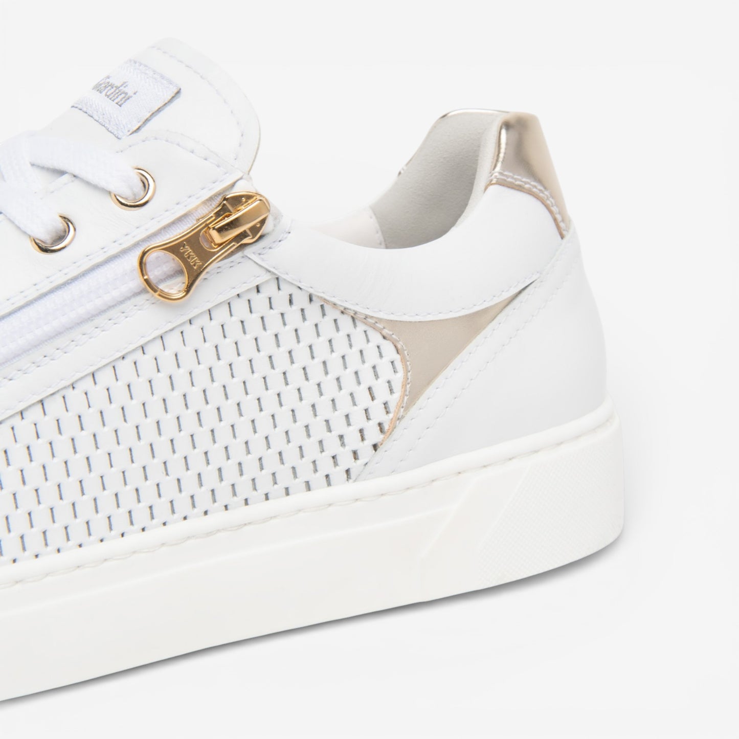 Nero Giardini | Sneakers in pelle traforata con cerniera laterale